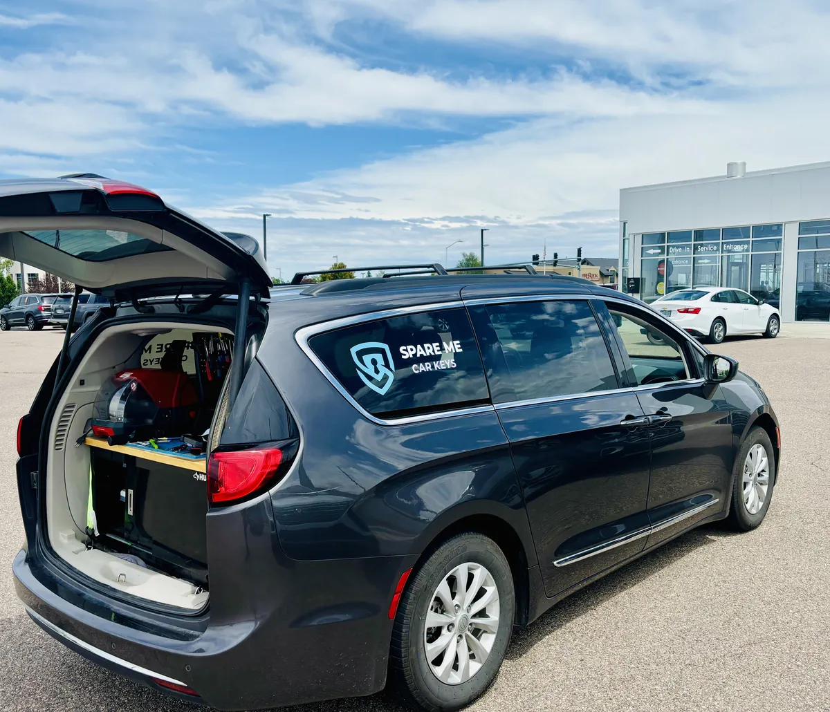 Spare Me service van with mobile locksmith workbench open